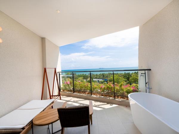 Sanya Conifer Resort : photo 2 de la chambre chambre lit king-size - vue sur mer