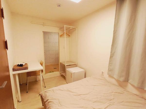 G Yongsan Inn : photo 7 de la chambre chambre double avec salle de bains privative