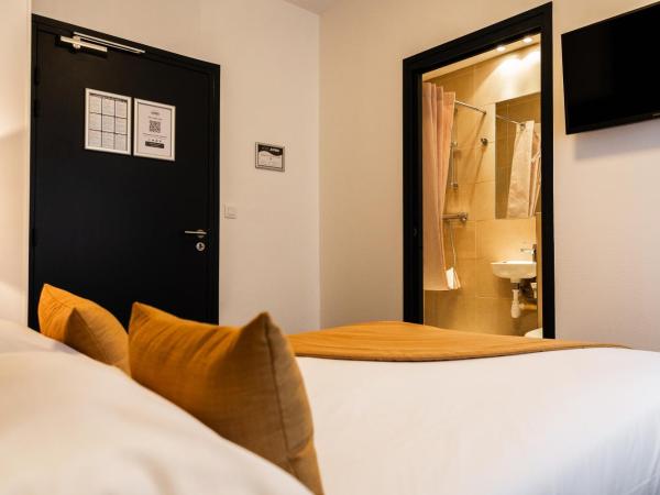Hotel Astrid Caen centre : photo 2 de la chambre petite chambre double