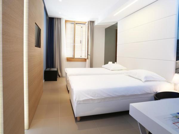 Guesthouse Villa Scalaria : photo 1 de la chambre chambre lits jumeaux