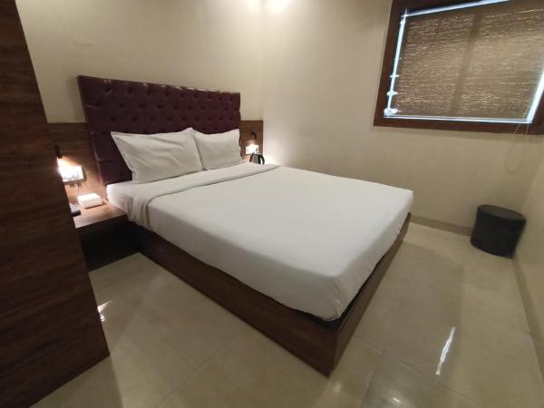 Hotel New Peninsula Suite - Near Masjid Bandar and CST Station - South Mumbai : photo 6 de la chambre chambre deluxe