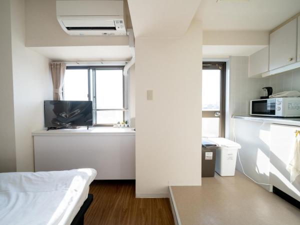 Nishinippori Guest House : photo 9 de la chambre chambre quadruple avec salle de bains privative