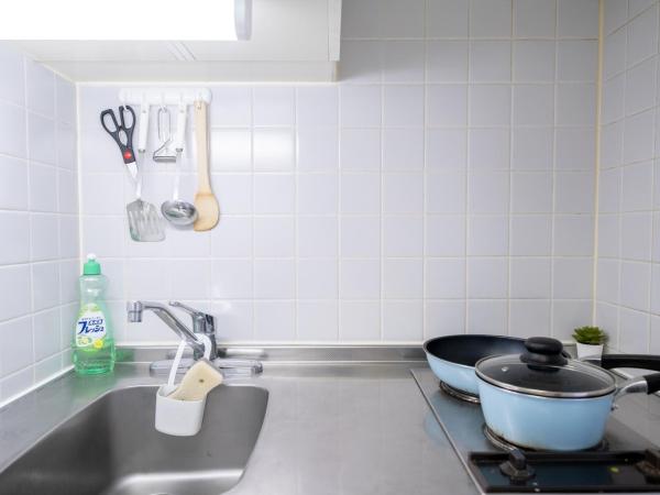 Nishinippori Guest House : photo 8 de la chambre chambre triple avec salle de bains privative