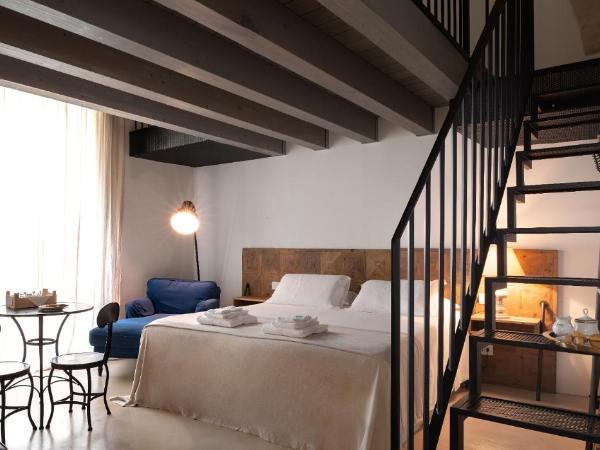 Palazzo Sant'Anna Lecce : photo 1 de la chambre suite lit king-size avec baignoire spa