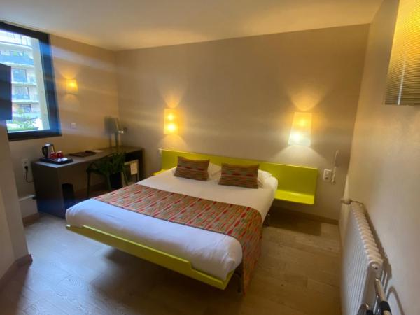 Hotel Des Lices : photo 4 de la chambre chambre deluxe (1 adulte + 1 enfant)