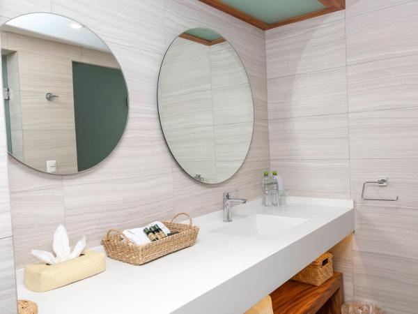 Hotel Boutique Naura Centro : photo 3 de la chambre suite lit king-size