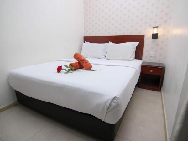 Rose Cottage Hotel Taman Perling : photo 1 de la chambre chambre double supérieure