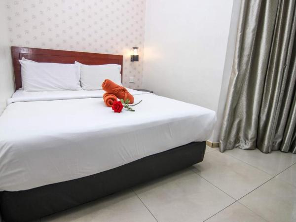 Rose Cottage Hotel Taman Perling : photo 3 de la chambre chambre double supérieure