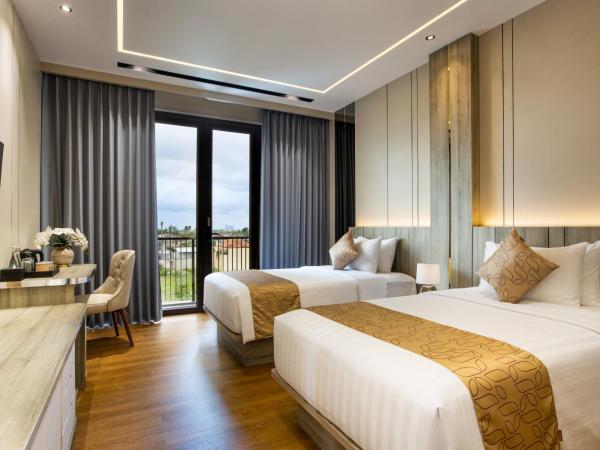 Kinaralana Hotel Yogyakarta : photo 2 de la chambre chambre lits jumeaux deluxe