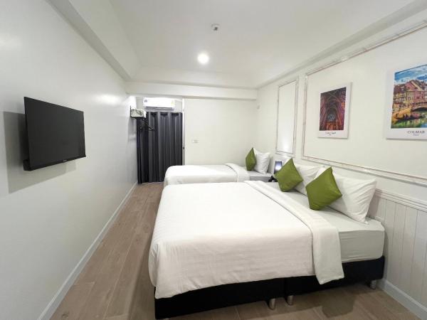 Travelier Hostel : photo 4 de la chambre chambre triple deluxe