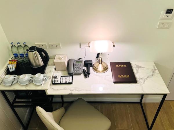 Travelier Hostel : photo 6 de la chambre chambre triple deluxe