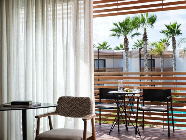 Stella Island Luxury Resort & Spa (Adults Only) : photo 7 de la chambre hébergement premium avec hammam - vue sur piscine