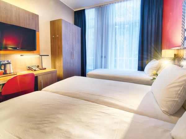 Leonardo Hotel Amsterdam City Center : photo 1 de la chambre chambre triple confort