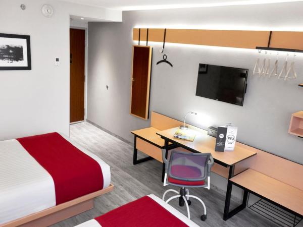 City Express by Marriott Mérida : photo 6 de la chambre chambre lit queen-size