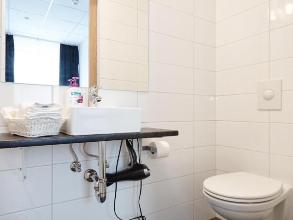 Hótel Heiðmörk : photo 3 de la chambre chambre simple avec baignoire