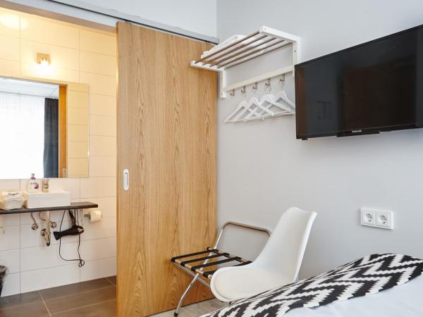 Hótel Heiðmörk : photo 2 de la chambre chambre simple avec baignoire