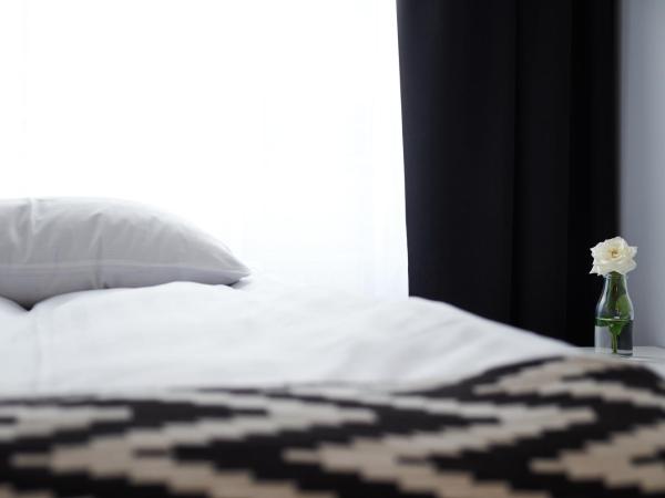 Hótel Heiðmörk : photo 4 de la chambre chambre simple avec baignoire