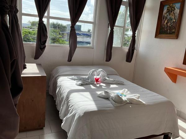 Hotel Bello Caribe : photo 1 de la chambre chambre familiale