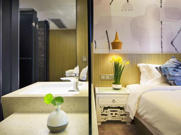 Paco Hotel Tianpingjia Metro Guangzhou - Canton Fair free shuttle bus : photo 3 de la chambre chambre lits jumeaux supérieure