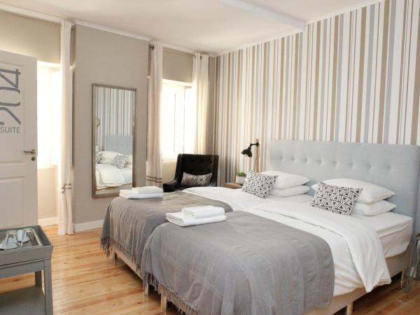 Flores Guest House : photo 1 de la chambre chambre double ou lits jumeaux supérieure