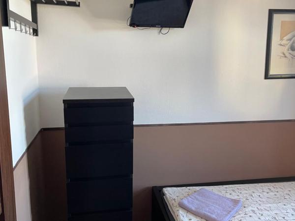 Hostel u Arény : photo 3 de la chambre chambre lits jumeaux avec salle de bains privative