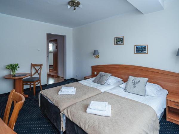 Zespół Dolina Białego - Pensjonat Biały Potok : photo 4 de la chambre chambre lits jumeaux avec balcon