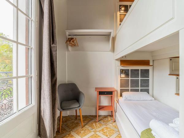 Casa Gracia : photo 5 de la chambre bed in 4-bed female dormitory room with city view