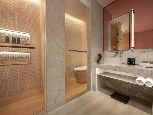 Hotel Indigo Wuxi Taihu New City : photo 5 de la chambre chambre lit king-size standard - vue sur jardin