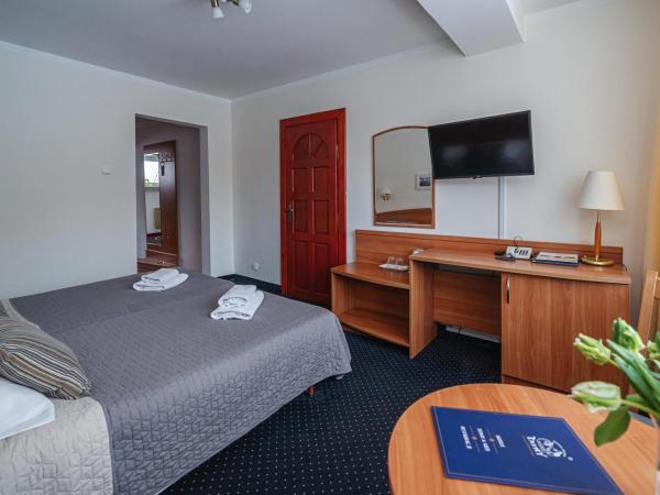 Zespół Dolina Białego - Pensjonat Biały Potok : photo 2 de la chambre chambre lits jumeaux