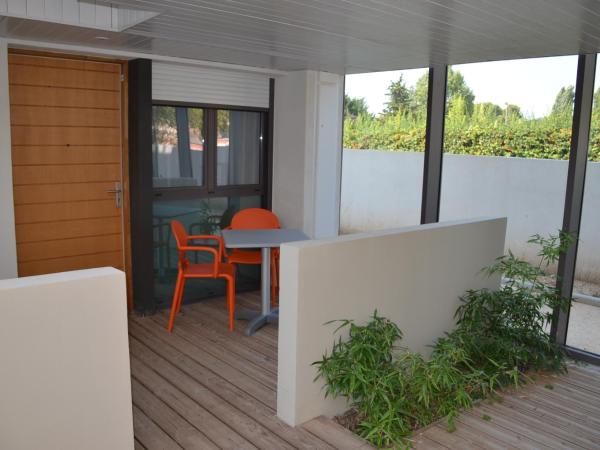 Adonis Aix en Provence : photo 4 de la chambre chambre lits jumeaux avec patio et terrasse