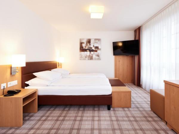 Central City Hotel Rochat : photo 4 de la chambre chambre triple