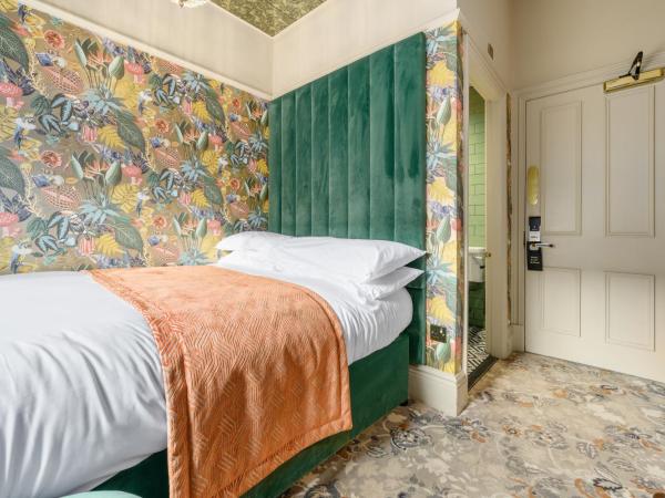 Clementine's Guest House : photo 3 de la chambre petite chambre lit queen-size