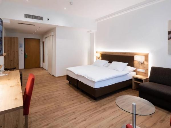 Central City Hotel Rochat : photo 2 de la chambre chambre triple