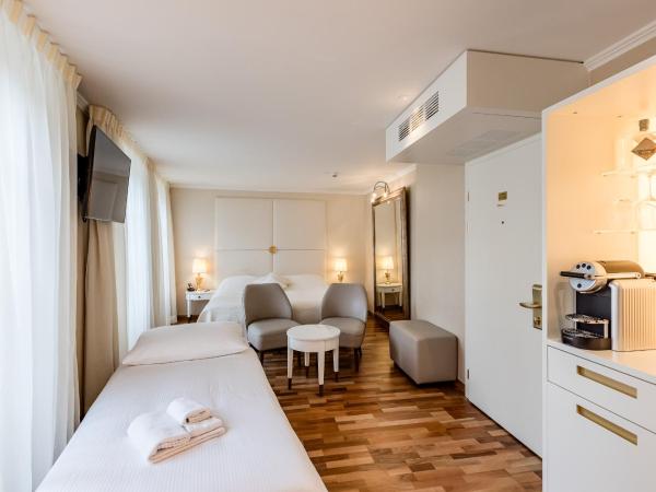 Hotel des Balances : photo 5 de la chambre chambre triple - vue sur ville