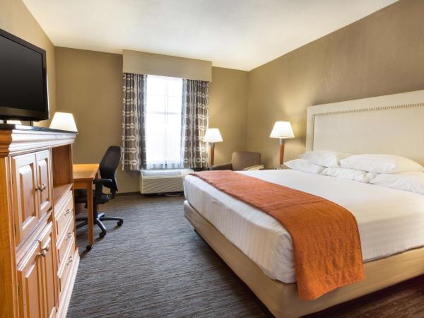 Drury Inn & Suites San Antonio North Stone Oak : photo 1 de la chambre chambre lit king-size deluxe