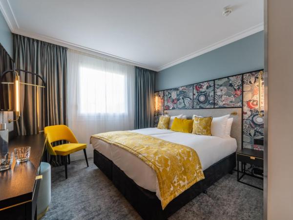 voco Paris Montparnasse, an IHG Hotel : photo 9 de la chambre chambre lits jumeaux cosy