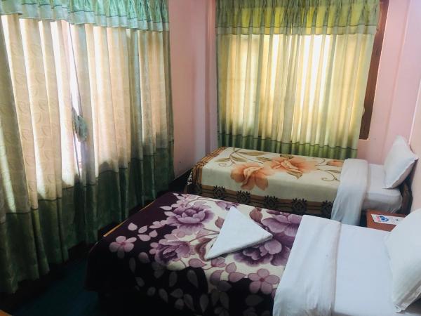 Hotel Green Orchid : photo 4 de la chambre chambre double avec salle de bains commune