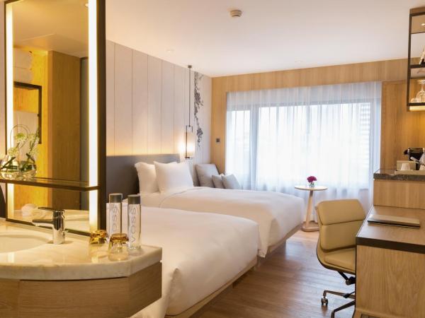 The Garden Hotel Guangzhou - Free shuttle between hotel and Exhibition Center during Canton Fair & Exhibitor registration Counter : photo 2 de la chambre chambre lits jumeaux premier