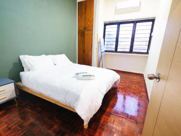 monstera guesthouse @ Ipoh Garden East : photo 3 de la chambre chambre double avec salle de bains commune