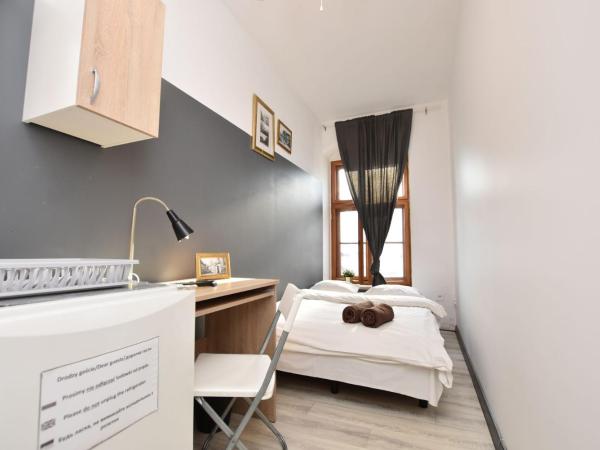 DUKES Hostel - Pokoje prywatne, RYNEK : photo 1 de la chambre chambre double avec salle de bains commune