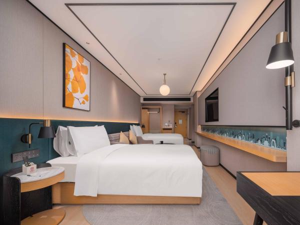 Hilton Garden Inn Beijing Temple Of Heaven East Gate Station : photo 6 de la chambre chambre lits jumeaux avec canapé-lit