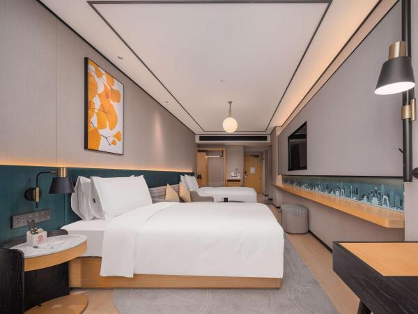 Hilton Garden Inn Beijing Temple Of Heaven East Gate Station : photo 1 de la chambre chambre lits jumeaux avec canapé-lit