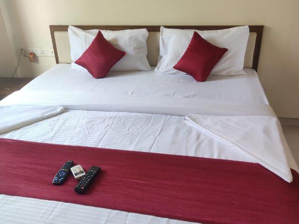 Atithi Service Apartment : photo 4 de la chambre chambre lit king-size deluxe