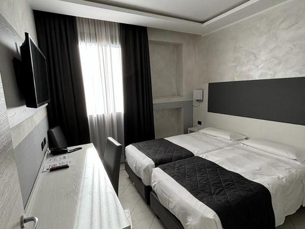 Hotel Plaza : photo 2 de la chambre chambre quadruple