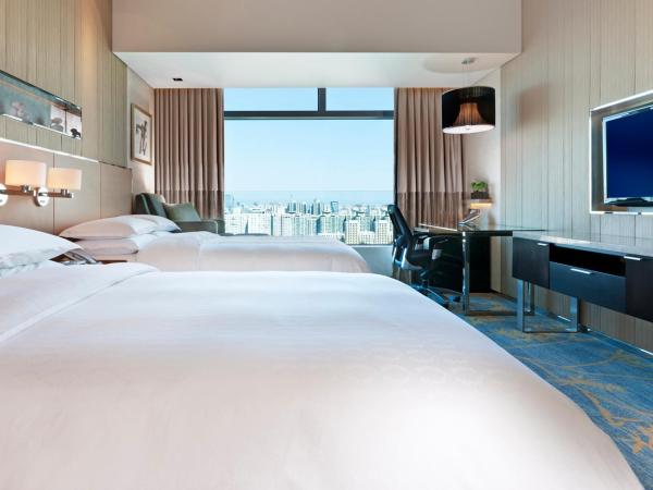 Sheraton Grand Beijing Dongcheng Hotel : photo 2 de la chambre chambre premier lits jumeaux, chambre 2 lits doubles - vue sur ville