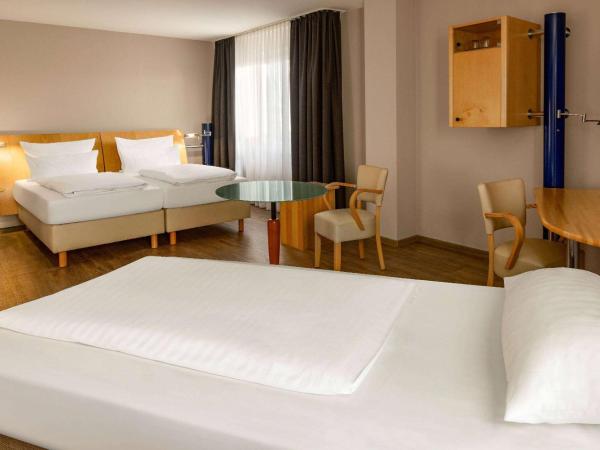 Amedia Dresden Elbpromenade, Trademark Collection by Wyndham : photo 1 de la chambre chambre salon plus