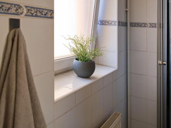 Stodolní Apartment : photo 8 de la chambre chambre quadruple avec salle de bains commune