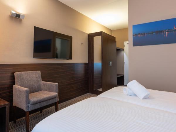 Hotel Docklands : photo 4 de la chambre chambre lits jumeaux - vue sur ville