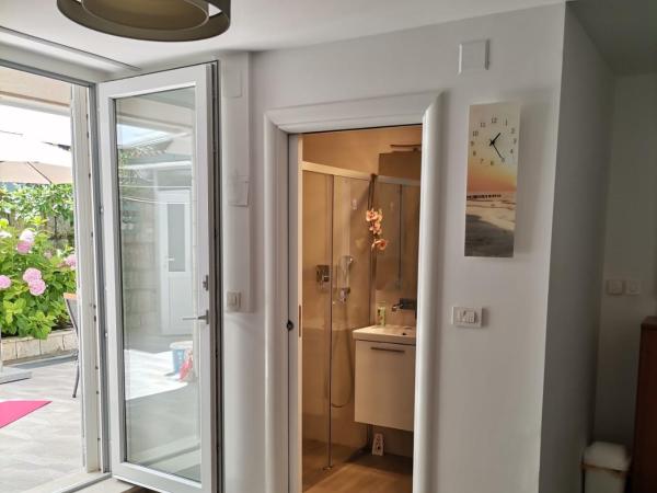 Apartment & Room Pajolo : photo 5 de la chambre chambre double ou lits jumeaux avec terrasse - vue sur jardin