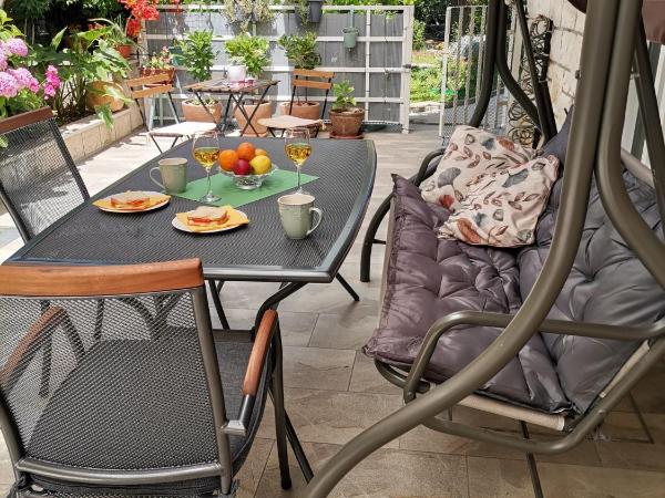 Apartment & Room Pajolo : photo 1 de la chambre studio avec terrasse et vue sur le jardin